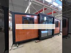 2 KN/m2 মেঝে লোডিং সহ প্রসারিত প্রিফ্যাব বাড়ি, জলরোধী পেইন্ট সিল করা প্রান্ত এবং কাস্টমাইজযোগ্য আকার